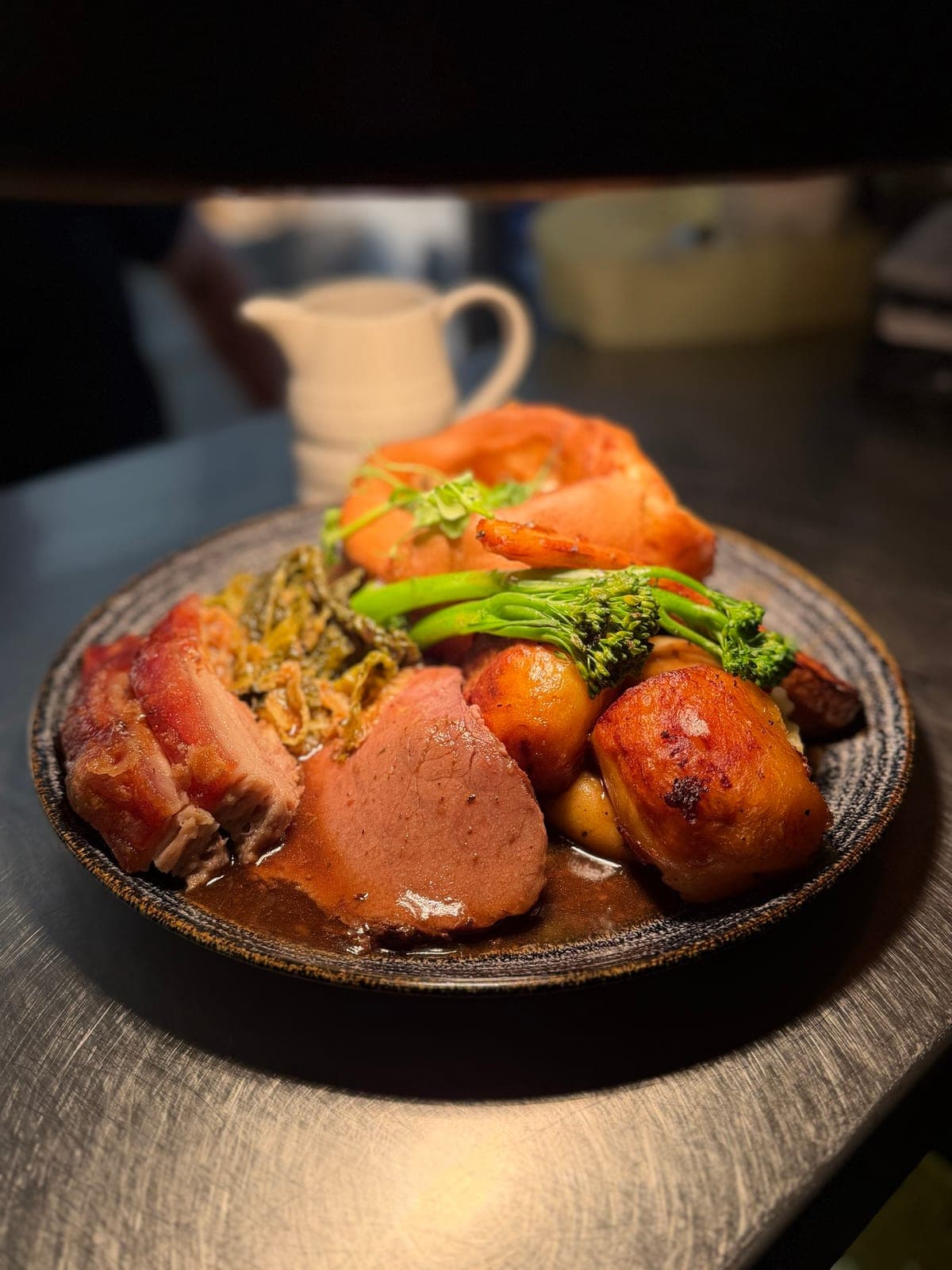 A Sunday roast at Jan'z: roast meats, Yorkshire pudding, roast potatoes and greens with gravy