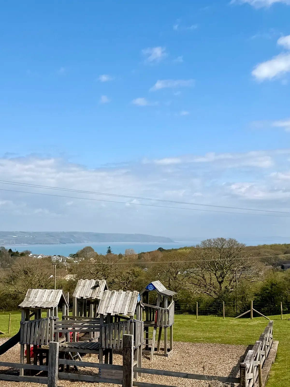 The children's play area at Broadfield, with views over the bay